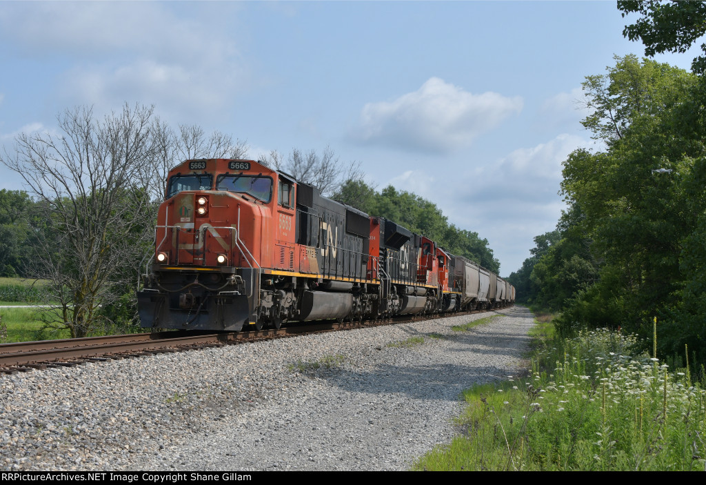 CN 5663 Rolls a freight south along the Ex Ic mainline.